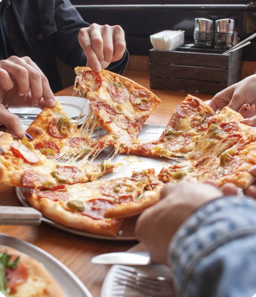 Friends sharing a pizza