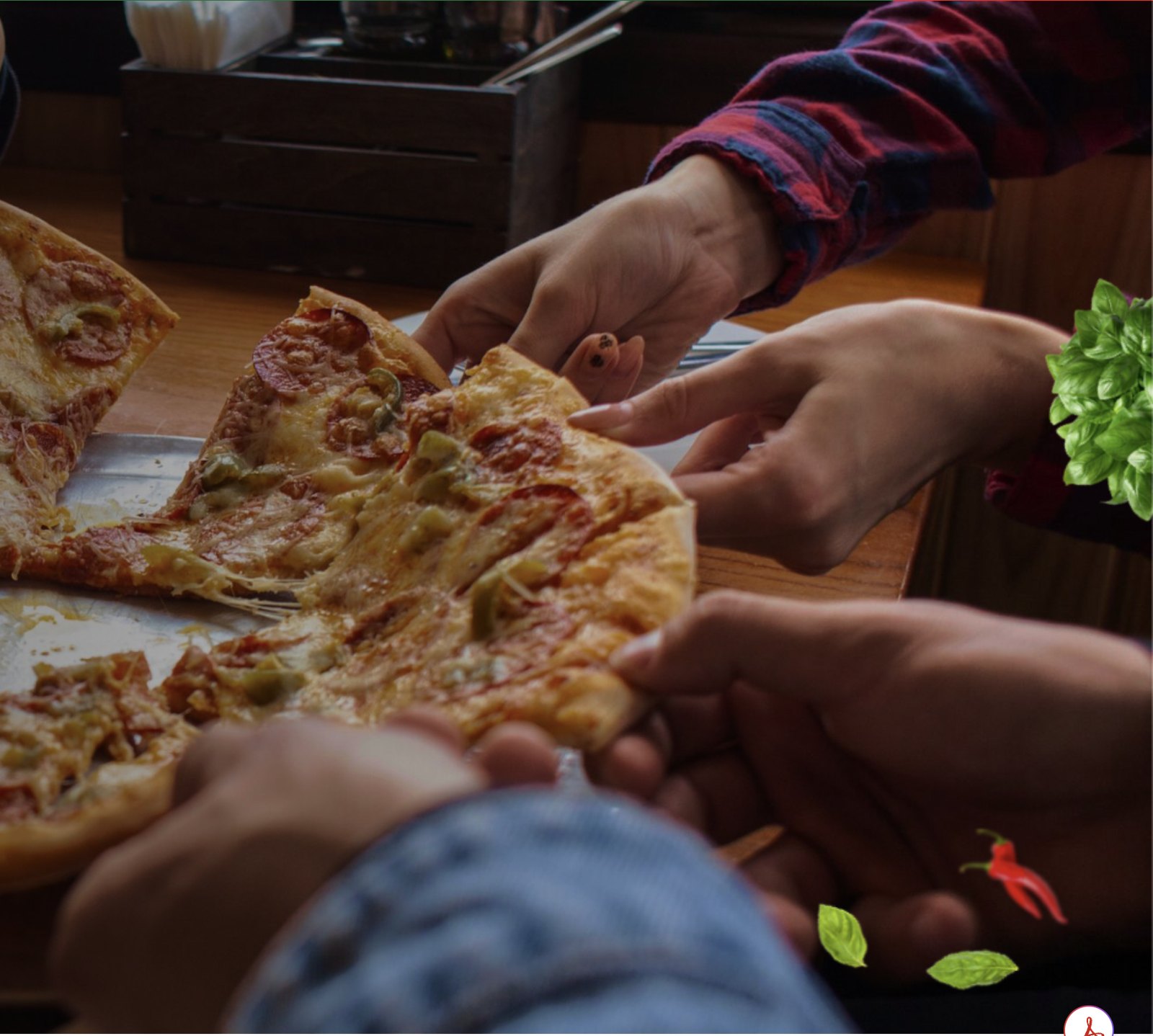 Friends sharing a hand-tossed pizza at Bobby V's